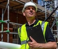 photo of man at construction site